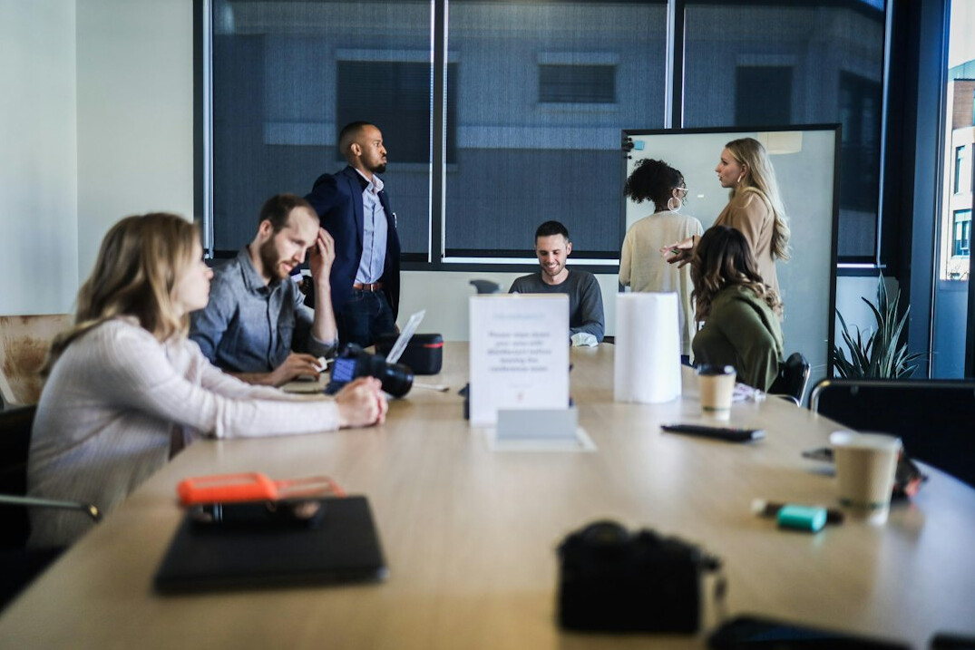 team discussing productivity